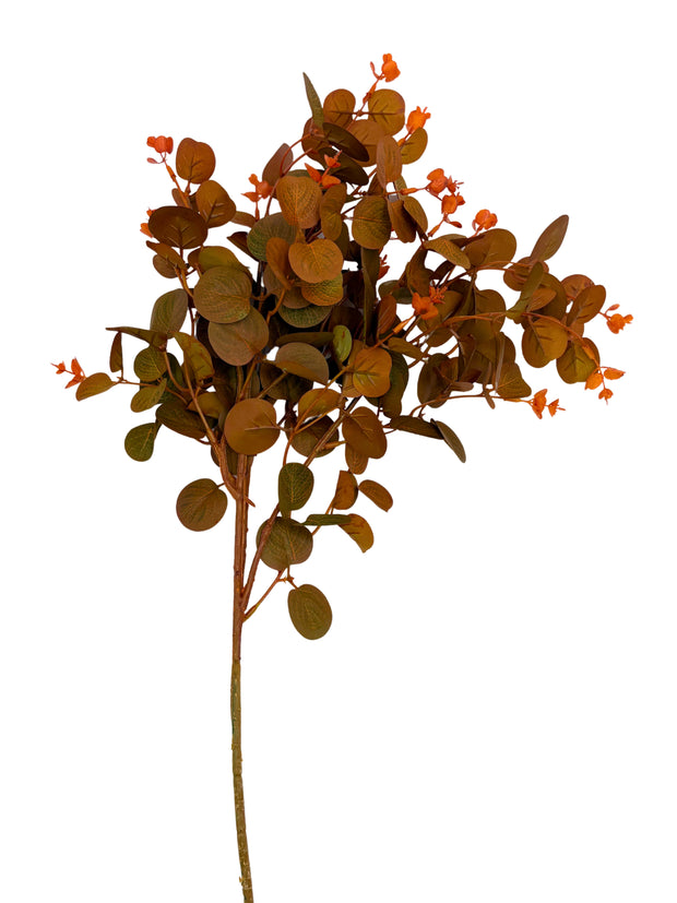 Artificial eucalyptus branch with green and orange leaves on a white background